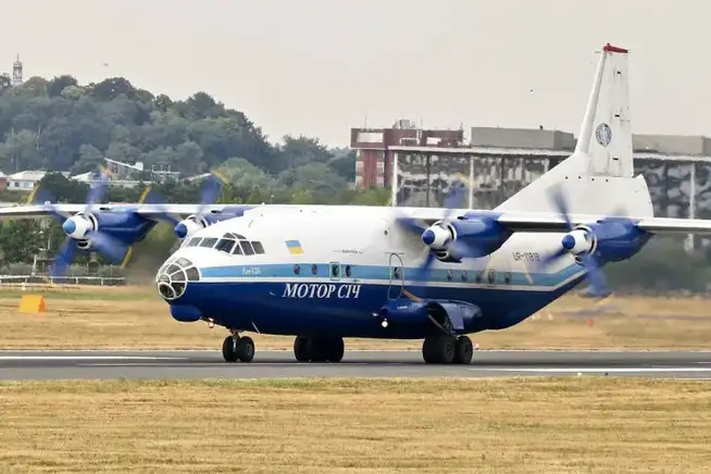 UR-11819 AN-12BP Motor Sich Airlines Farnborough 12.7.18 Colin Cooke Photo Antonov An-12 photo