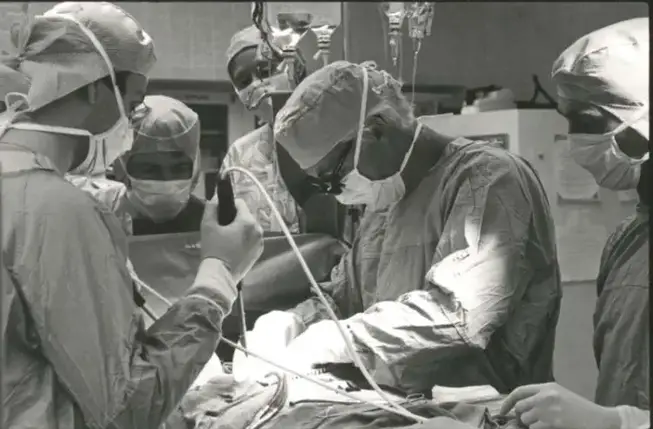 Unidentified persons in operating room Stanford Medical History Center heart transplantation photo